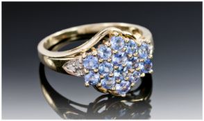 9ct Gold Tanzanite Dress Ring, Set With A Central Cluster Of Light Blue Tanzanites, Diamond Set