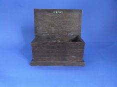 Small Oak Lidded Box, the lid with inset plaque inscribed `Parkinson, 1915`, 5 inches high.