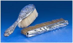 Art Nouveau Silver-Backed Brushes. 2 in total. A) Hallmarked Birmingham 1908, 6.5 inches in length;