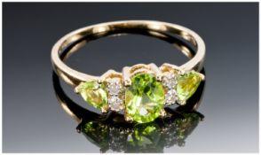 9ct Gold Dress Ring, Set With Three Lime Green Coloured Stones Between Diamond Chip Spacers,