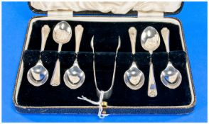 Cased Set Of Six Silver Teaspoons With Crossed Golf Clubs Finial. Together With Silver Sugar Tongs.