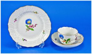 Meissen Hand Painted Trio, comprising cup, saucer and small plate, each piece having a white