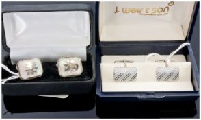 Two Pairs Of Gents Silver Cufflinks.