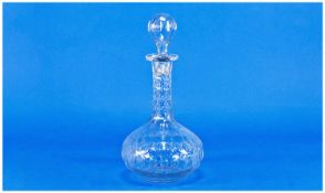 A Pair of Victorian Cut Glass Decanters, of shaft and onion form, the globular stopper with concave