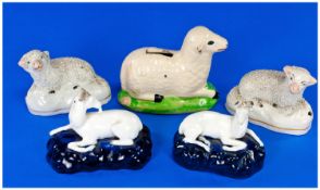 Staffordshire Miniature Sheep And Deer Figures, Comprising Prattware Recumbent Sheep Money Box,