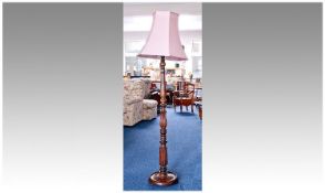 Late 20th Century Turned Standard Lamp, fitted with pink shade, the column elaborately turned with