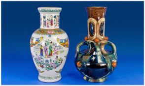 Belgian Art Nouveau Majolica Vase, the cup shaped body and tall, slightly flaring neck having a