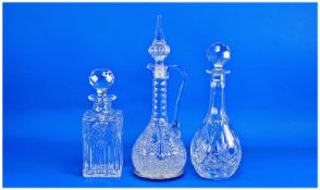 Three Glass Decanters with faceted stoppers, one with EPNS coaster.