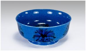 William Moorcroft Footed Bowl. circa 1920 Corn Flower, on powder blue mottled ground/ 7.75 inches
