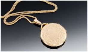 9ct Gold Locket And Chain, The Hinged Locket Of Circular Form With All Over Foilage Decoration.