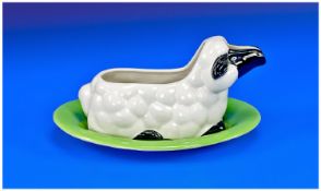 Carlton Ware Early 20th Century Sauce Boat, in the form of a sheep, complete with associated stand,