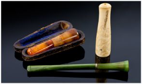 Cased Cheroot Holder With Amber Mouth Piece, Together With A Green Art Deco Cigarette Holder + 1