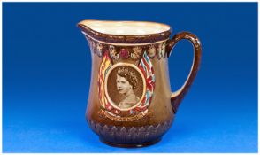 A Royal Doulton Commemorative jug The Coronation of Queen Elizabeth II 1953. With raised image of
