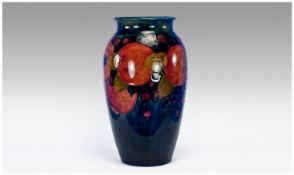 Large Moorcroft `Pomegranate and Berries` Ovoid Vase, the deep band of tubelined decoration, in the