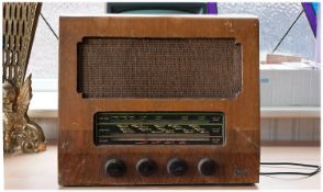 Walnut Veneered `Marconiphone`, Radio, circa 1950, with a short wave, medium wave and long wave.