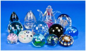 A Mixed Selection of Twentieth Century Glass Paperweights, various colours, designs shapes and