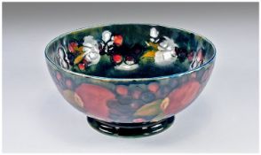 Moorcroft Signed Footed Bowl, `Pomegranate & Berries` pattern. Circa 1920`s. 3.5`` in height, 7.