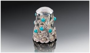 A Large Sterling Silver Thimble decorated to the exterior in wirework relief and set with nine