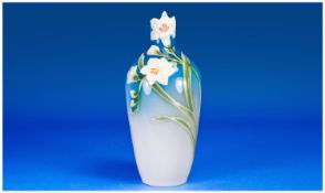 A Striking Franz Vase. The tapering bottle shaped vase decorated in fine relief with flowering and