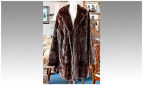 Ladies Russian Squirrel Three Quarter Length Coat. Fully lined. Side slit to back.