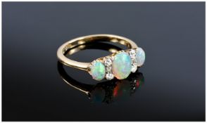 Edwardian 18ct Gold Opal and Diamond Ring. The good quality opal interspaced with diamonds. Fully