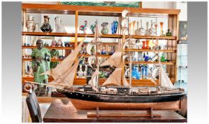 Large 20th Century Wooden Model of the Cutty Sark, hand crafted,  with linen sails, raised on