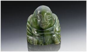 An Early 20th Century Green Carved Buddah Figure. Spinach Colourway. 1.5 inches high.
