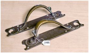 Pair of Art Nouveau Copper Door Handles, circa 1905, with large curved handles and sinuous curved