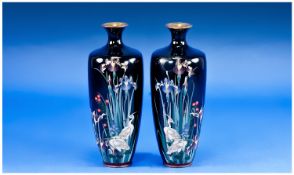 Japanese 1920`s Pair Of Cloisonne Vases decorated with images in stylised cranes on black ground.