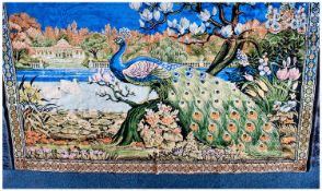 Medium Sized Rug depicting peacock in parkland setting, surrounded by floral foliage with vibrant