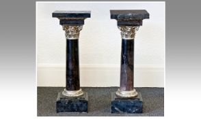 Pair of Classical Style Black Varigated Marble Column Stands, with applied ormolu mounts, 20th