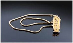 Egyptian High Carat Gold Tag supported on a 9 ct gold chain. Stamped 375. 13.1 grammes.
