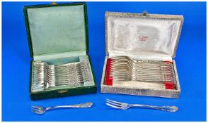 French Good Quality Boxed Sets Of Silver Plated 12 Piece Grape Fruit Forks, 2 in total. With the