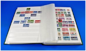 Hingeless Stamp Album Containing a Large Collection of UK Pre-Decimal and Decimal Used Stamps. From