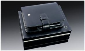Mont Blanc Quality Black Leather Filofax with original wrapper and box and papers. Mint condition.