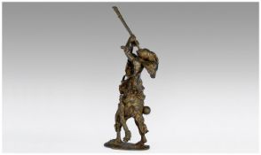 20th Century Bronze Figure/Statuette Of A Noth African/Moorish Warrior playing a large horn. Signed