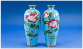 1920`s Pair Of Roses Wireless Cloisonne Vases on powder blue ground. Each 7.25`` in height.