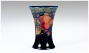 William Moorcroft Small Vase, Pomegranate & Berries Design. Circa 1920`s. Signed to base. 4.25`` in