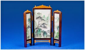 A Miniature Chinese Table Screen with 3 marble panels, finely decorated with a continuous mountain