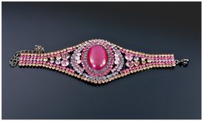 Butler & Wilson Style Cat`s Eye Crystal Bracelet, large oval magenta cat`s eye feature, framed with