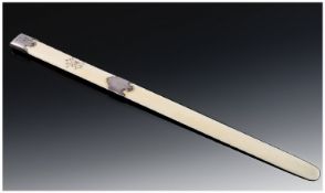 French Late Nineteenth Century Ivory Letter Opener with silver mounts. 9.75 inches long.