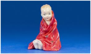 Royal Doulton Child Figure, `This Little Pig`, HN1793, seated child wrapped in a red floral