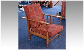 Early 20th Century Wooden Manuel Reclining Chair, wood grained, with loose seat and back cushions,