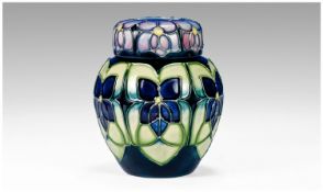 Moorcroft Signed Ginger Lidded Jar `Violetts` Design. Date 21.8.97. 4.25`` in height.