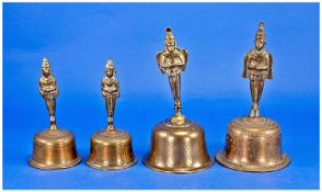 Four 20th Century Brass Bells, Indian style, each with tribal figures to tops, engraved.