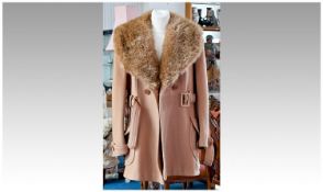 Cashmere Jacket with `Fur` trim and tie belt.