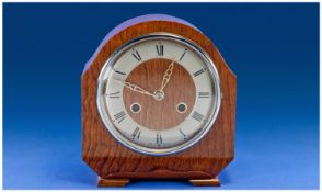 Bentima Oak Cased Mantel Clock, 8 day striking movement with silvered dial chrome bezel. 8.5 inches