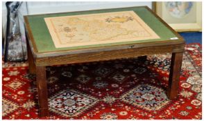Late 20th Century Glass Topped Coffee Table, the glass top over a reproduction of Saxon`s map of