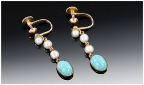 Murrle Bennett & Co A Pair Of Early 20thC Drop Earrings Each Set With Three Pearls Above A Closed