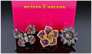 Butler and Wilson. Flower and Butterfly multi-coloured stone set rings. 3 in total. As new